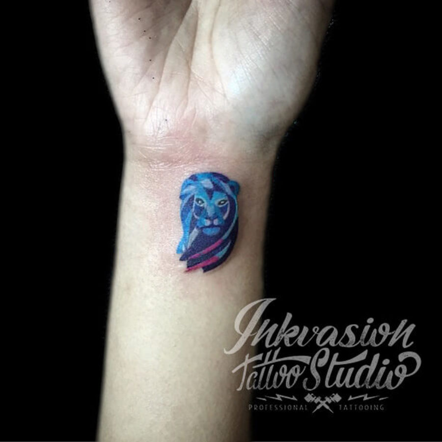 Tiny Lion Tattoo